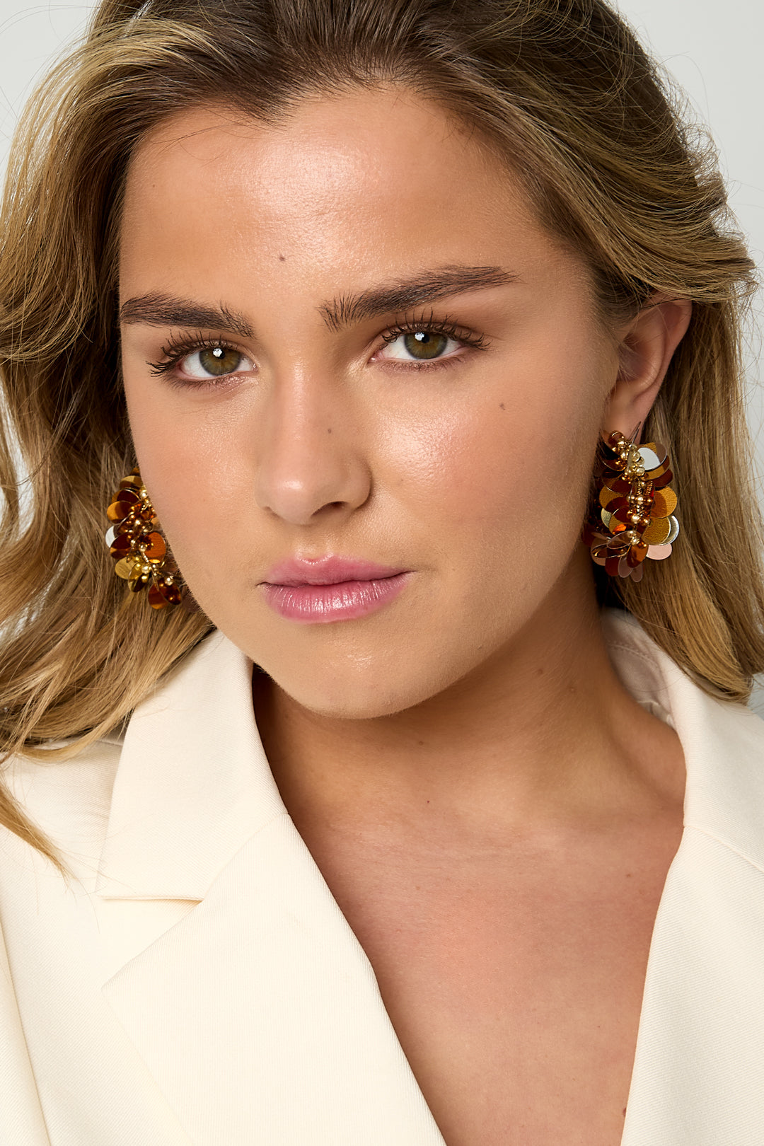 Hoop earrings made of sequins and beads